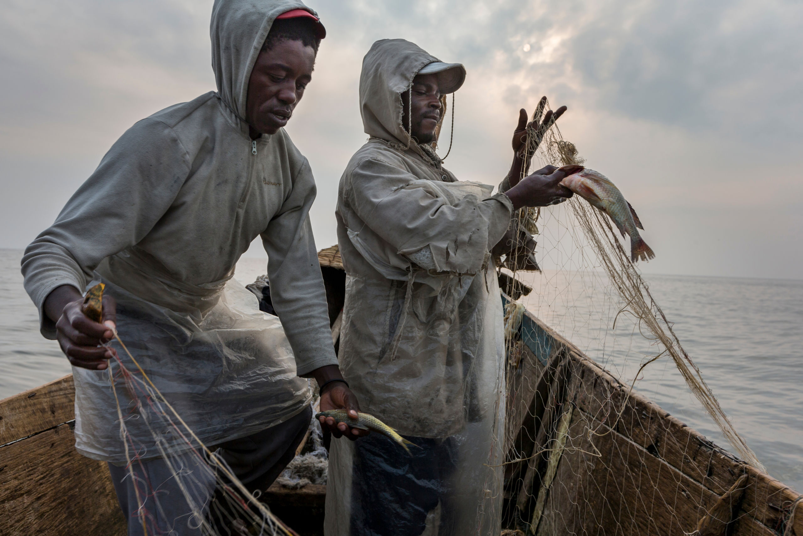 Fishermen working on the southern shores of Lake Edward, Vitshum